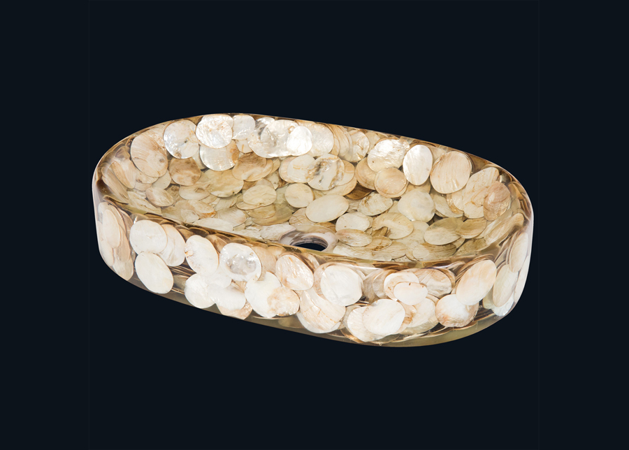 Pesuallas simpukankuorilla